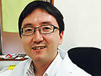 写真：医師 簗 由一郎